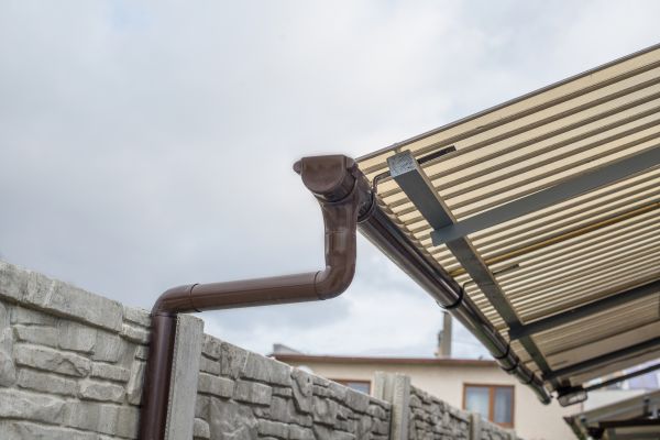 Plastic Downspout Installation in Frisco